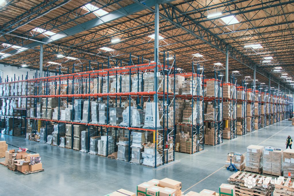 Pallet rack components arranged in installed rows